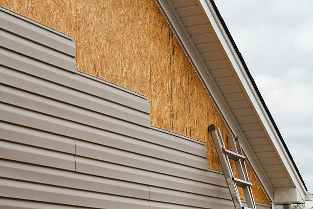 Professional Vinyl Siding technician working in Vandergrift, PA